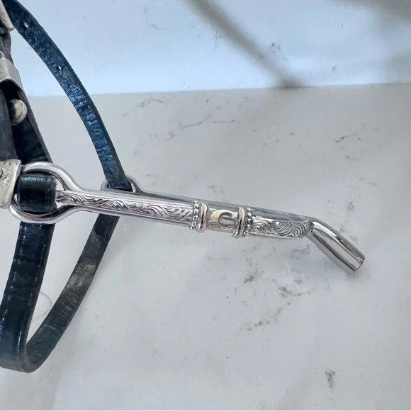 Engraved English 1” spurs by Holly Spagnola with initial C